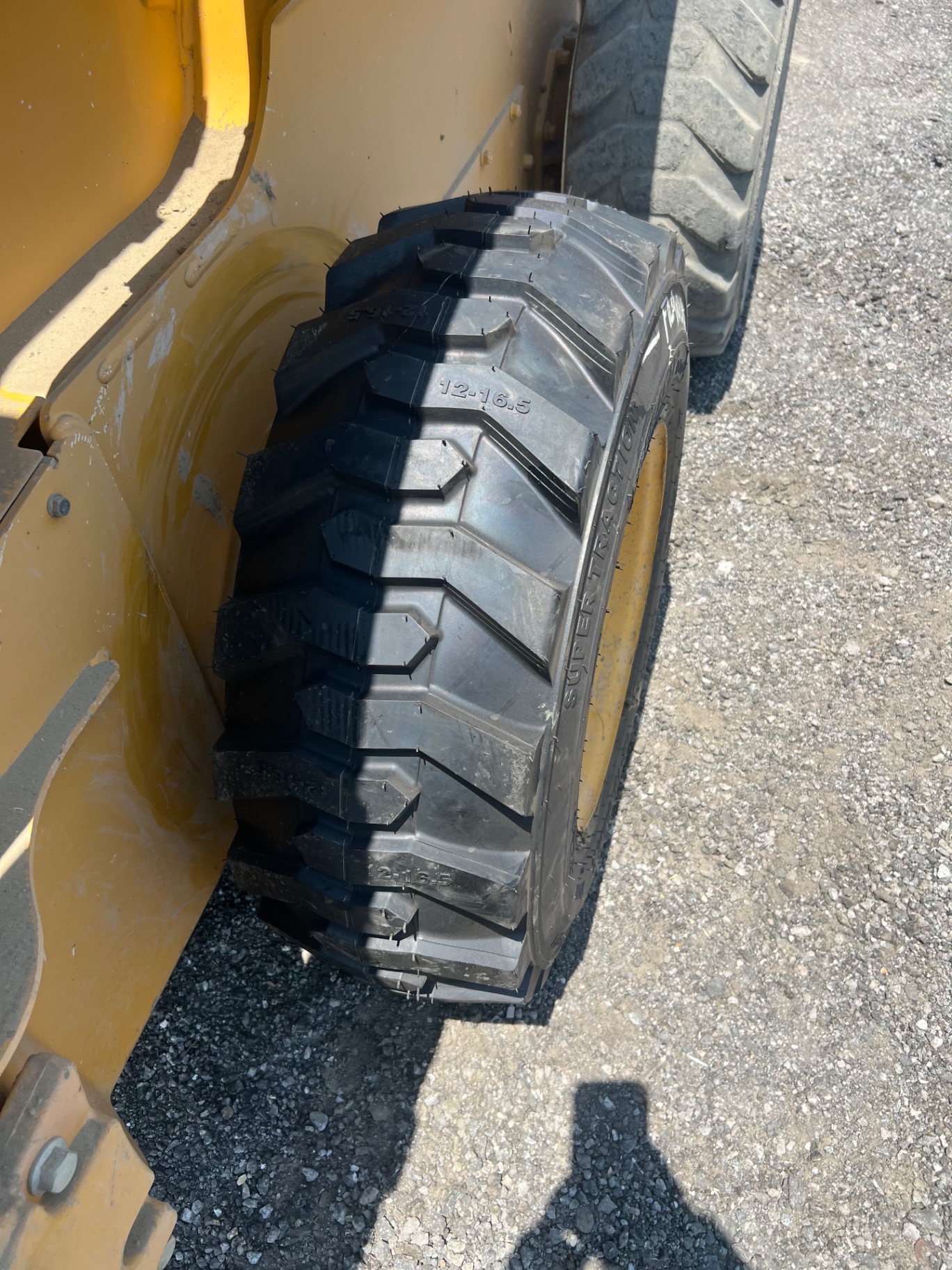Heavy duty skid steer tire with aggressive tread serviced by F&K Tires LLC